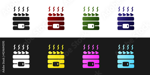 Set Hot sauna stones icon isolated on black and white background. Spa resort recreation, bathhouse relaxation. Hot stones on electric heater. Vector