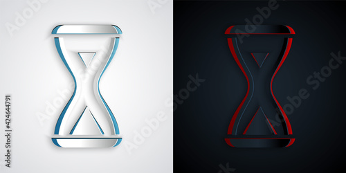 Paper cut Sauna hourglass icon isolated on grey and black background. Sauna timer. Paper art style. Vector