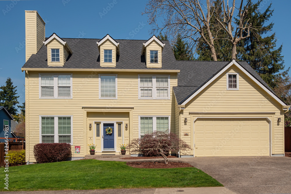 Yellow mansion home in a neighborhood Gresham Oregon. Yellow mansion home in a neighborhood Gresham Oregon.