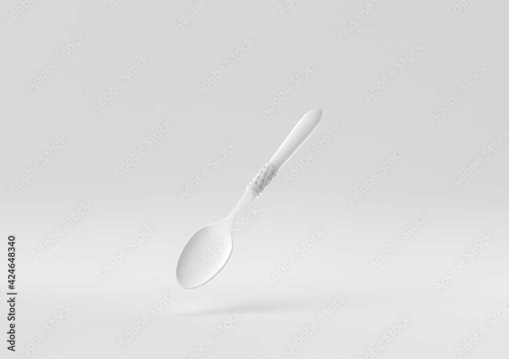 White spoon floating in white background. minimal concept idea creative. monochrome. 3D render. White spoon floating in white background. minimal concept idea creative. monochrome. 3D render.