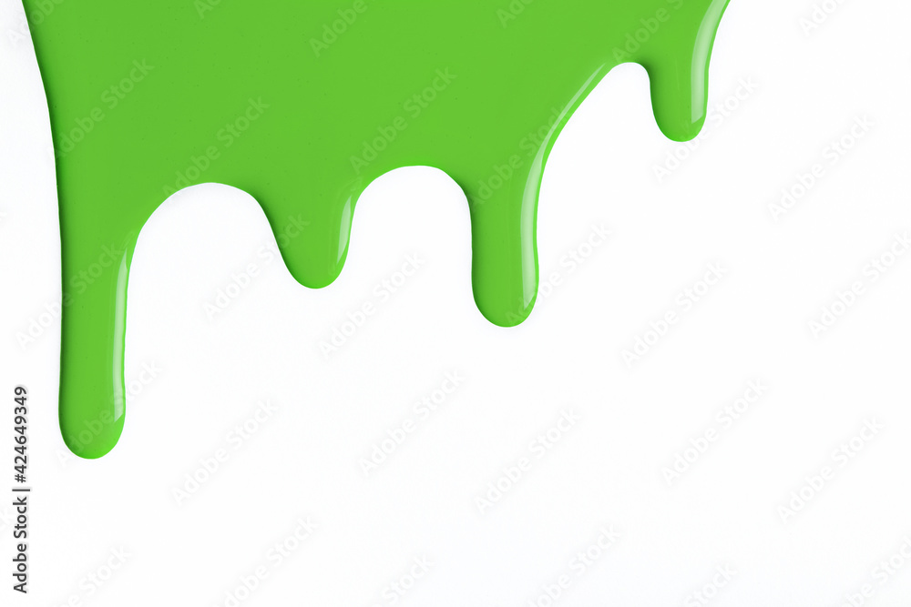Green liquid drops of paint color flow down isolated white background. Abstract olive backdrop with fluid drip pattern. Green liquid drops of paint color flow down isolated white background. Abstract olive backdrop with fluid drip pattern.