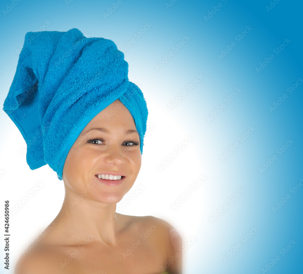 Spa Girl. Beautiful Young Woman After Bath with blue towel. isolated on white Spa Girl. Beautiful Young Woman After Bath with blue towel. isolated on white