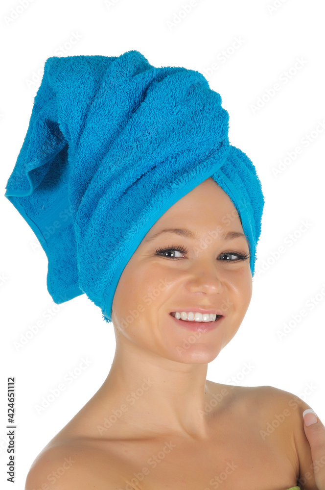 Spa Girl. Beautiful Young Woman After Bath with blue towel. isolated on white
