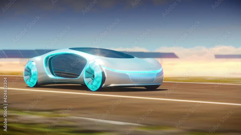 The eco-friendly electric car rides along solar panels. The eco-friendly electric car rides along solar panels.