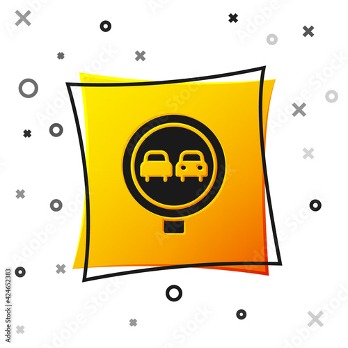 Black No overtaking road traffic icon isolated on white background. Traffic rules and safe driving. Yellow square button. Vector