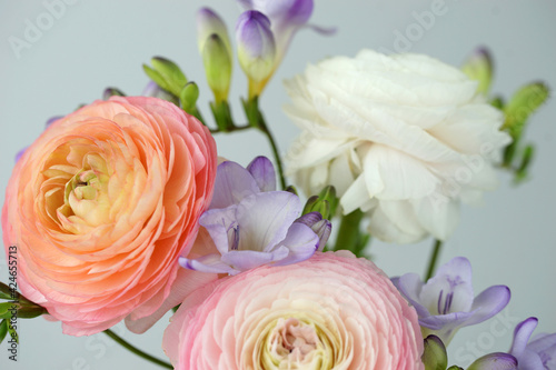 Beautiful bouquet with spring ranunculus and freesias