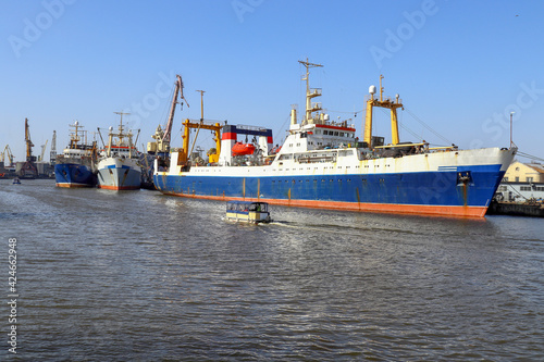 Kaliningrad port. Baltic Sea. Vessels and cranes in the port. Fishing trawlers