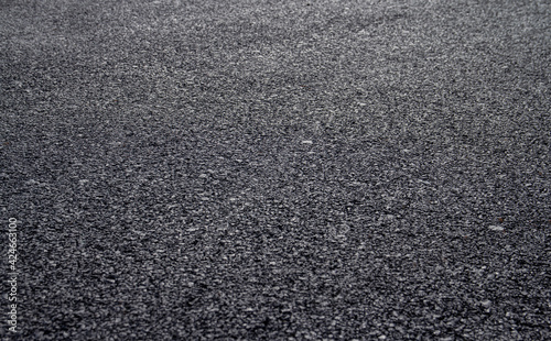 New asphalt road background with selective focus