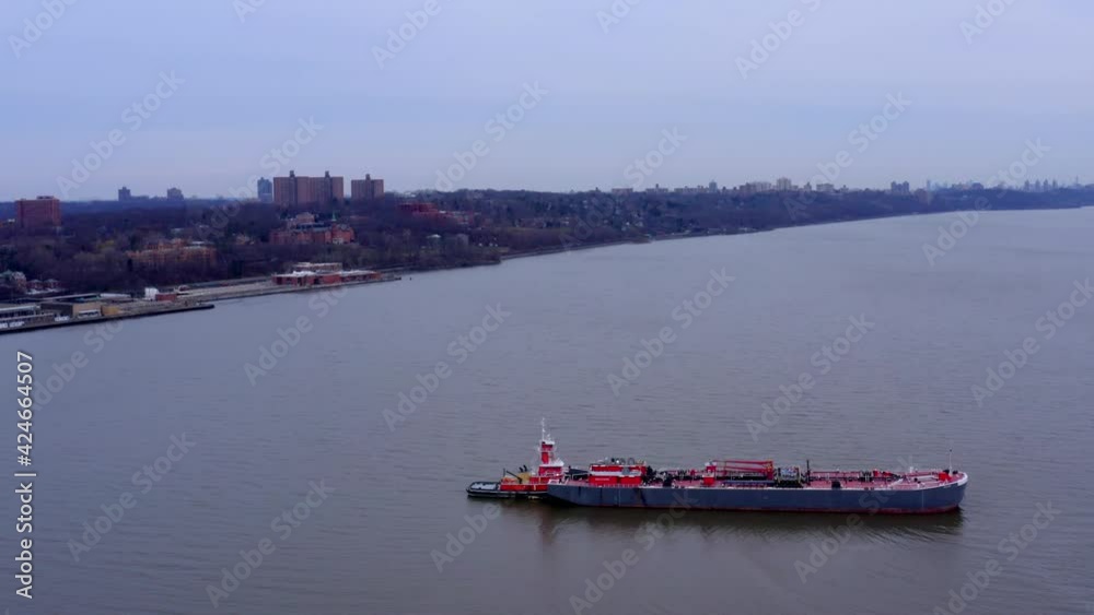 Aerial circle of barge moored in Hudson River, USA Aerial circle of barge moored in Hudson River, USA