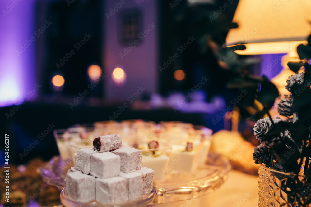 A close up of a cake with lit candles