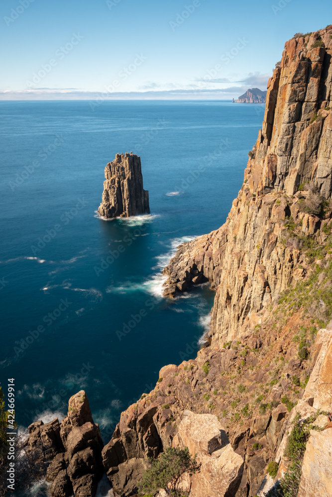Cliffs of Cape hauy in bright morning sun, Tasmania, Australia
