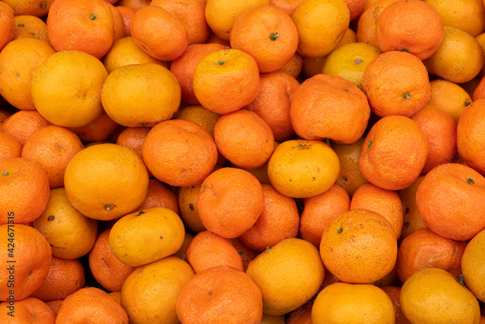 Mandarin orange or Tangerine orange pattern use for background,wallpaper,poster,banner. Mandarin orange or Tangerine orange pattern use for background,wallpaper,poster,banner.