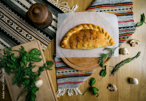 Traditional Georgian adjara khachapuri and Kolkh khachapuri on the table. Homemade baking. Top view. Flat lay