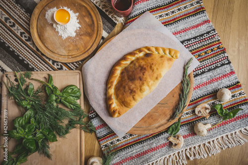 Traditional Georgian adjara khachapuri and Kolkh khachapuri on the table. Homemade baking. Top view. Flat lay photo