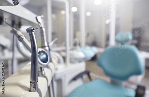 Dental office and dental tools with text space, close-up.