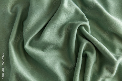 wrinkled surface of soft khaki fleece, background, texture