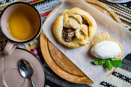 Traditional Georgian sweets and desserts with hazelnuts, walnuts, grape juice, honey, chocolate. Baklava, nakhini, churchkhela. Fresh fruits and candied fruits. Traditional Turkish coffee. photo