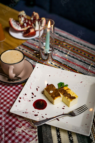 Traditional Georgian sweets and desserts with hazelnuts, walnuts, grape juice, honey, chocolate. Baklava, nakhini, churchkhela. Fresh fruits and candied fruits. Traditional Turkish coffee. photo