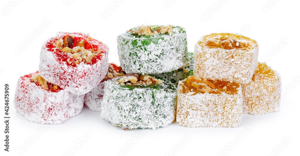 Colorful Turkish delight with nuts in powdered sugar isolated on white