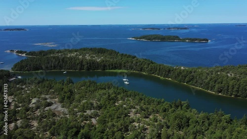 Wallpaper Mural Aerial view of a sailboats, anchored in island narrows, summer day, Scandinavia - pull back, tilt up, drone shot Torontodigital.ca