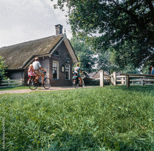 Toll house. Traditional historic houses. Open air museum Orvelte Westerbork Drenthe Netherlands. Village. Countryside. Reed roofs.  photo
