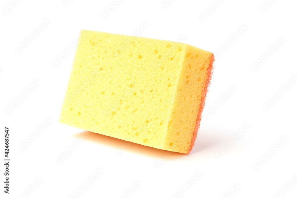 yellow kitchen sponge isolated on white. the concept of cleanliness and order
