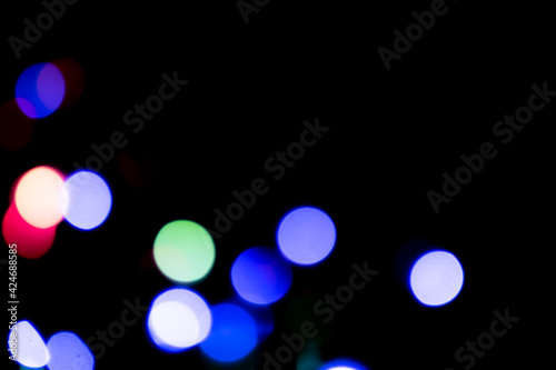Colorful bokeh lights festive background