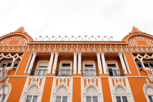 Low angle view of historical buildings from Oradea Old Town photo