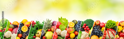 Different fruits and vegetables separated sloping lines on green