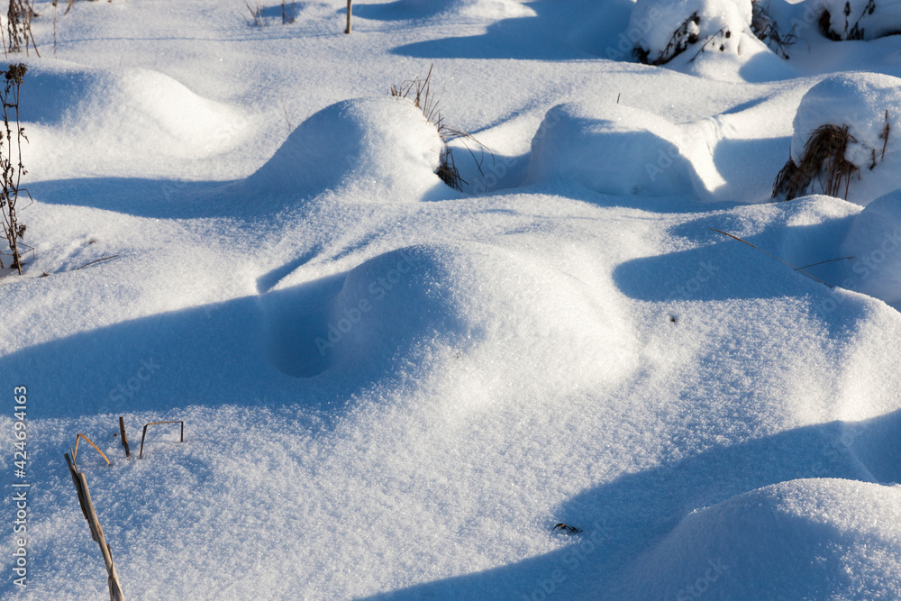 hummocks in the swamp large drifts after snowfalls