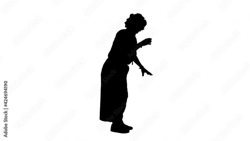 Silhouette Actor dressed as a clown looking for a way to act in a funny way. Silhouette Actor dressed as a clown looking for a way to act in a funny way.