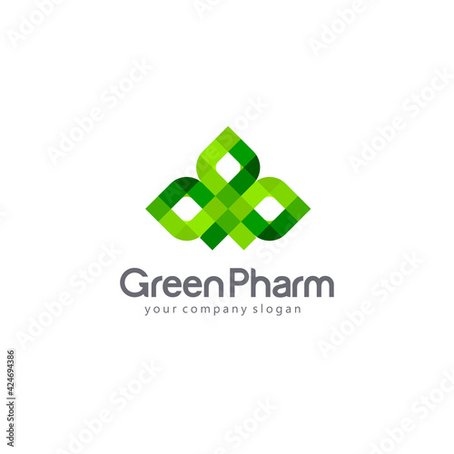 Vector logo pharmacy template. Green cross from the leaves. Eco, bio, organic emblem.