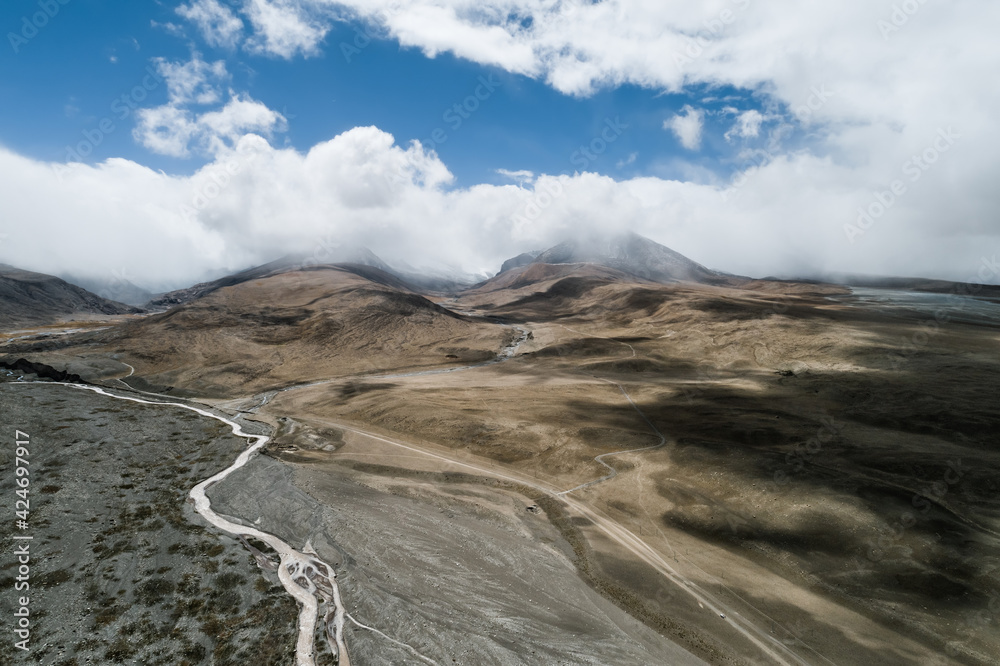 Aerial photo of gravel road in the wilderness of Tibet