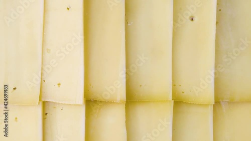  Cheese cut slices background. natural dairy product
