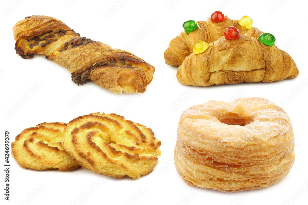 Assorted traditional dutch cookies and buns on a white background