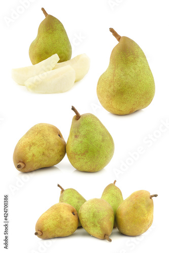 fresh "doyenne de comice" pears and a cut one on a white background