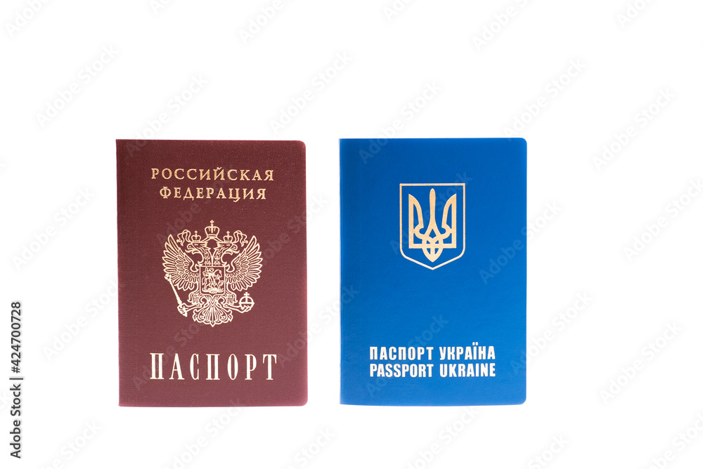 Passport of the Russian Federation and Ukrainian foreign passport isolated on white background