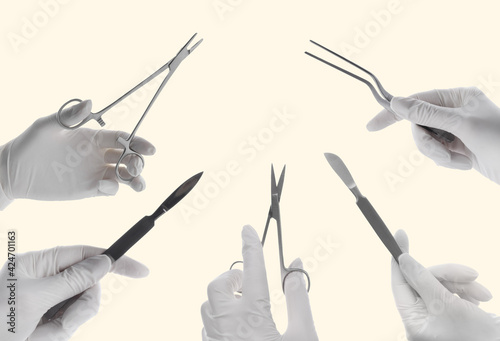Cuadro en lienzo Collage with photos of doctors holding different surgical instruments on white b