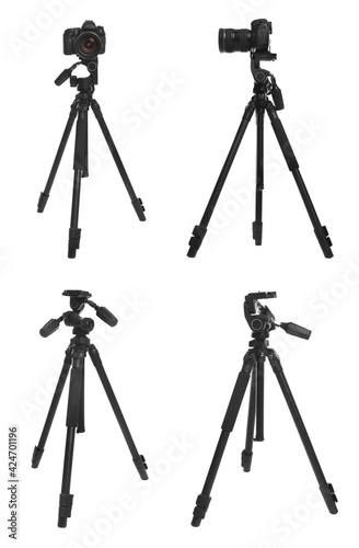 Set of modern tripods with professional cameras on white background