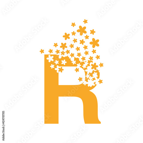 The letter R dissolves into a cloud of flowers