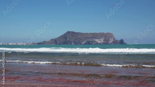 Oceans and islands hit by rough waves. The scenery of Seongsan Ilchulbong, Jeju Island.	
