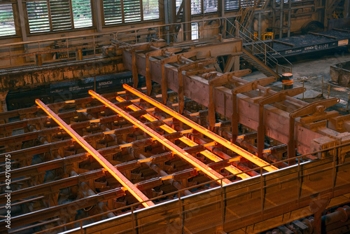 Steel production in electric furnaces. Sparks of molten steel.
