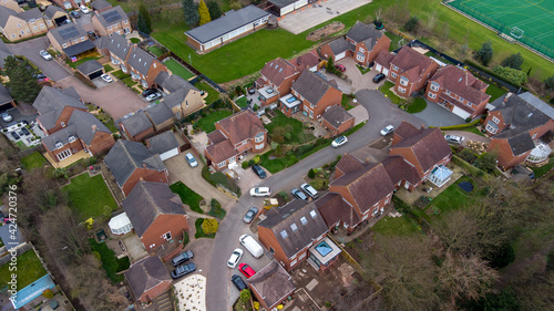 Aerial photo of a typical residential housing estate in the UK, taken in the village of Alverthorpe in Wakefield West Yorkshire showing a modern cul-de-sac residential housing estate in the spring