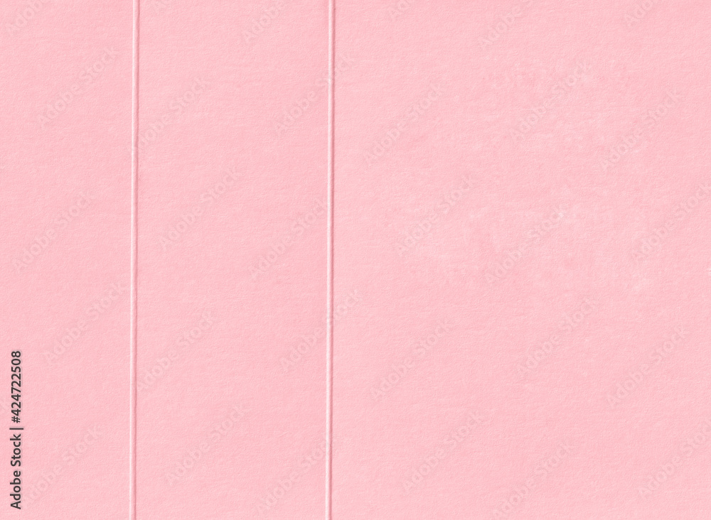 Fototapeta premium Pink paper texture background. Light romantic wallpaper