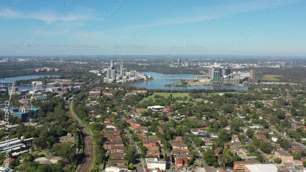 Rhodes suburb on Sydney West – shores of Parramatta river – aerial 4k.
Rhodes suburb on Sydney West – shores of Parramatta river – aerial 4k.