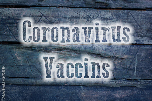 Coronavirus Vaccins Concept text on background