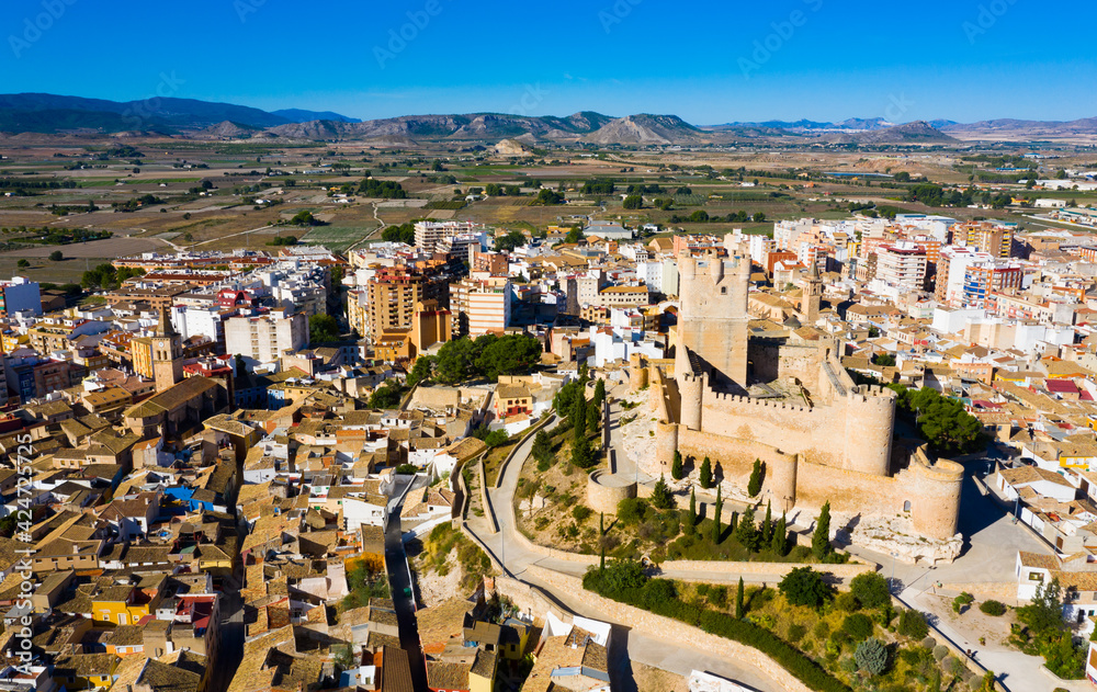 Picturesque aerial view of Spanish city of Villena with old castle Castillo de Castalla