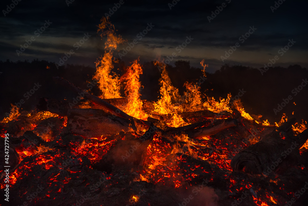 landscape with bonfire, night and hot flame.