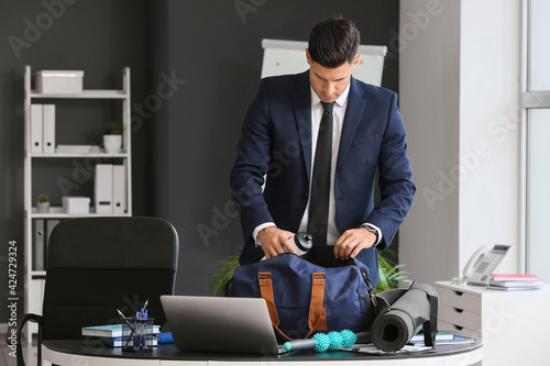 Young businessman going to ...