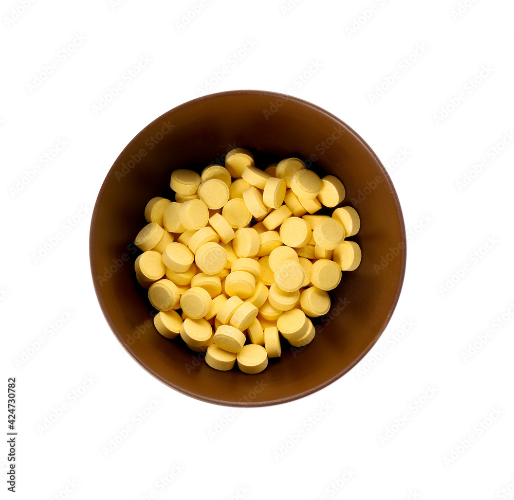 Bowl with folic acid pills on white background Bowl with folic acid pills on white background